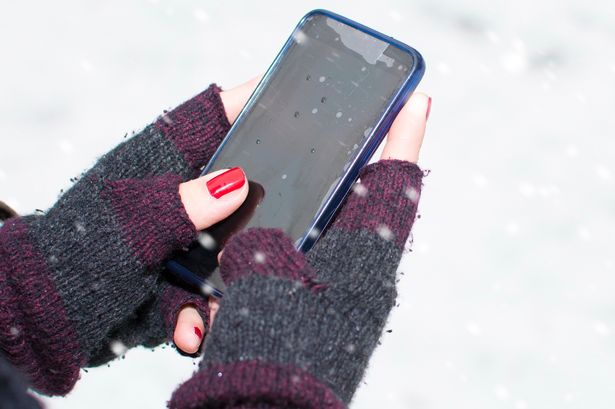 Phone out on a cold weather
