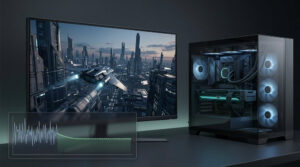 Gaming PC and monitor displaying gameplay with a frame-time graph transitioning from uneven spikes to a smoother line.